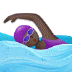 🏊🏿‍♀️ woman swimming: dark skin tone display on Samsung